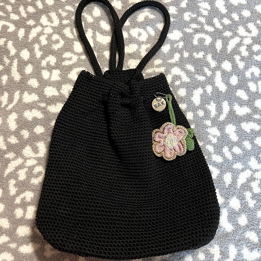 The Sak Black Crochet Backpack with Floral Accent